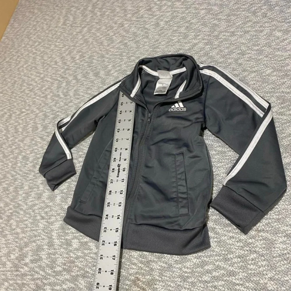 Adidas black & gray jacket with white stripes on sleeves kids size 4. SKU-B191